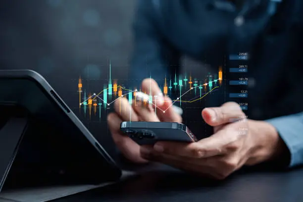 Illustration depicting a trader analyzing price charts and technical indicators on a computer screen, symbolizing the application of technical analysis in trading various financial instruments